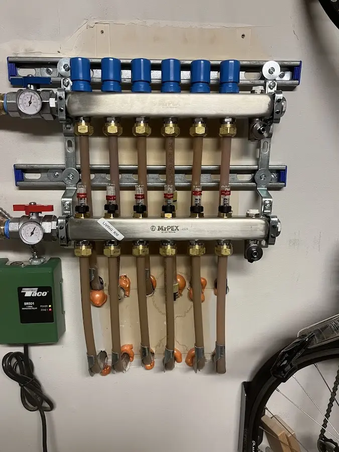 Plumber performing Gas Line Installation at a residential property in Livingston